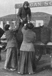 Image shows three women loading coal onto a lorry (National Records of Scotland reference: HH31/27/57)