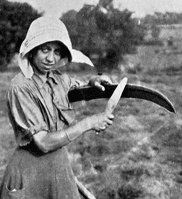 Image shows part of a photograph of a woman sharpening a scythe (National Records of Scotland reference: HH31/27/51/3/44)