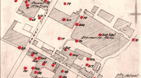 Image shows detail of street plan of Greenock, with bomb hits from 6th-7th May 1941 blitz marked in red. National Records of Scotland reference HH50/162 p.6